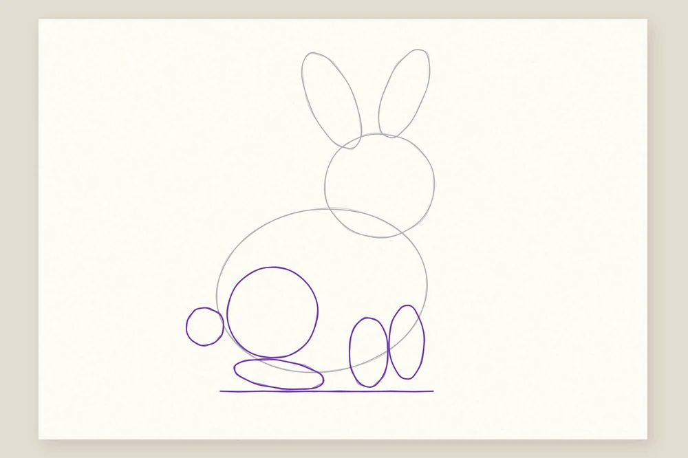 Dessin de lapin étape 3 : un rond pour la cuisse, un long pied, deux petites pattes avant et une queue en pompon