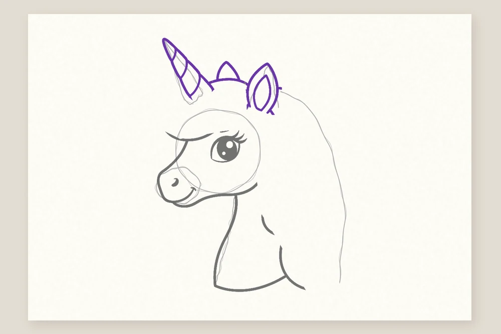 Dessin tête de licorne étape 3 : la corne torsadée et les oreilles